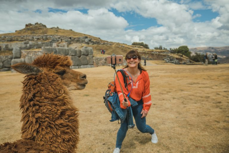 Saqsaywaman portrait woman llama