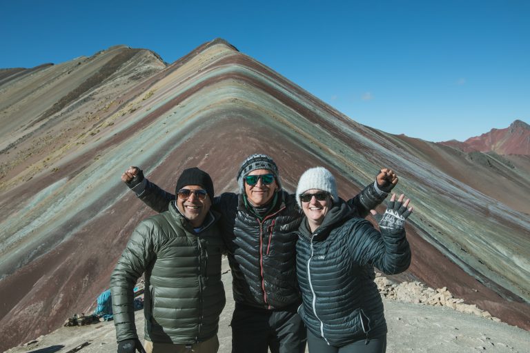 rainbow mountain peru tour group summit guide