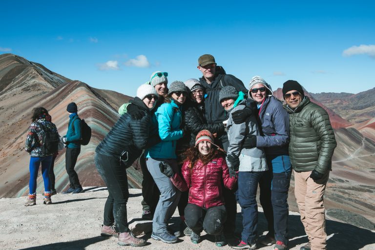 rainbow mountain peru tour group happy